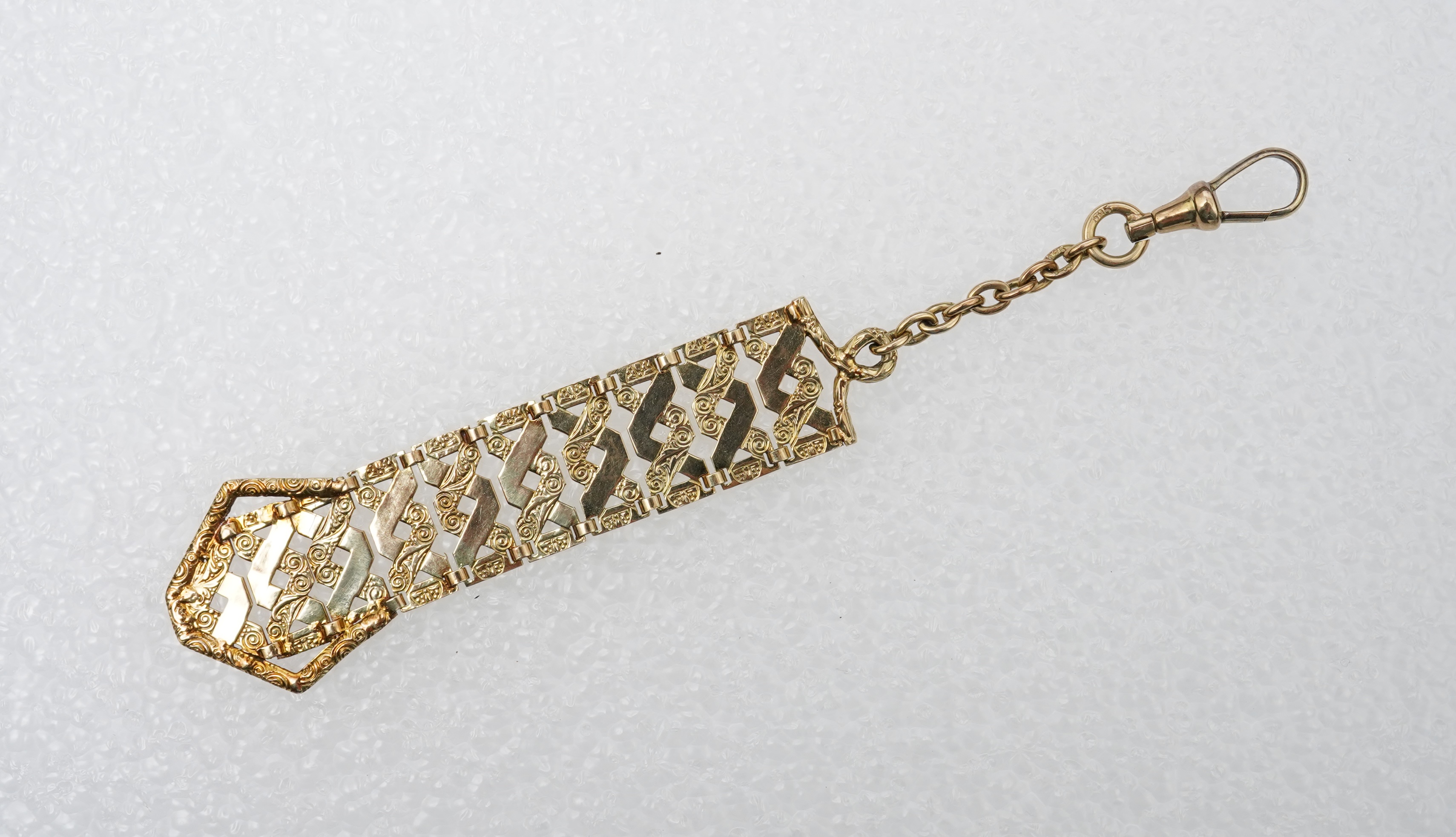 An unusual gold pendant, early 20th century